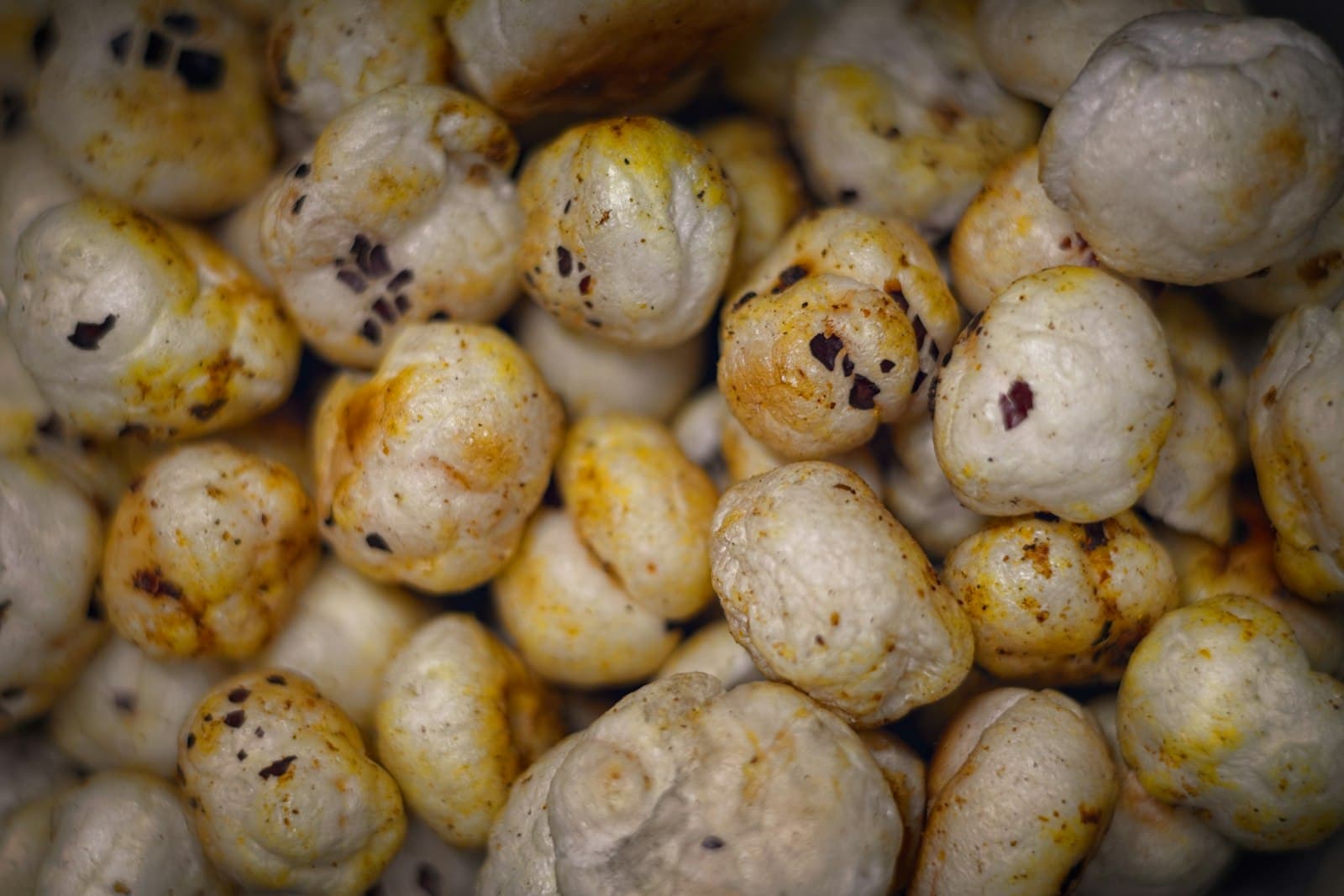 Seasoned, golden roasted makhana (fox nuts) with visible spice